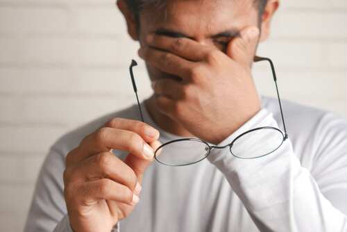 HR professional reviewing employee payroll data